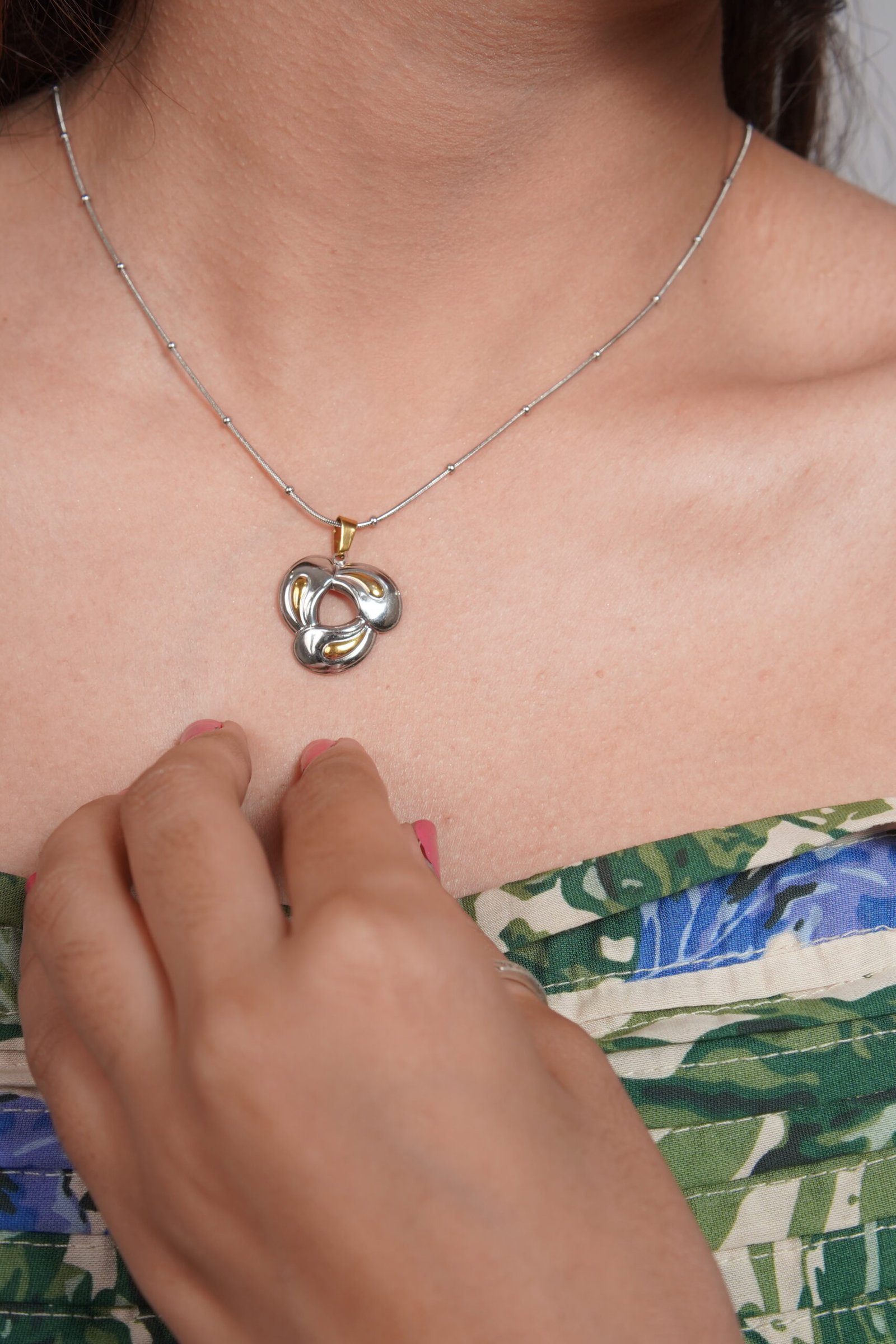 Abstract Dual-Tone Interlocking Triskelion Pendant Necklace